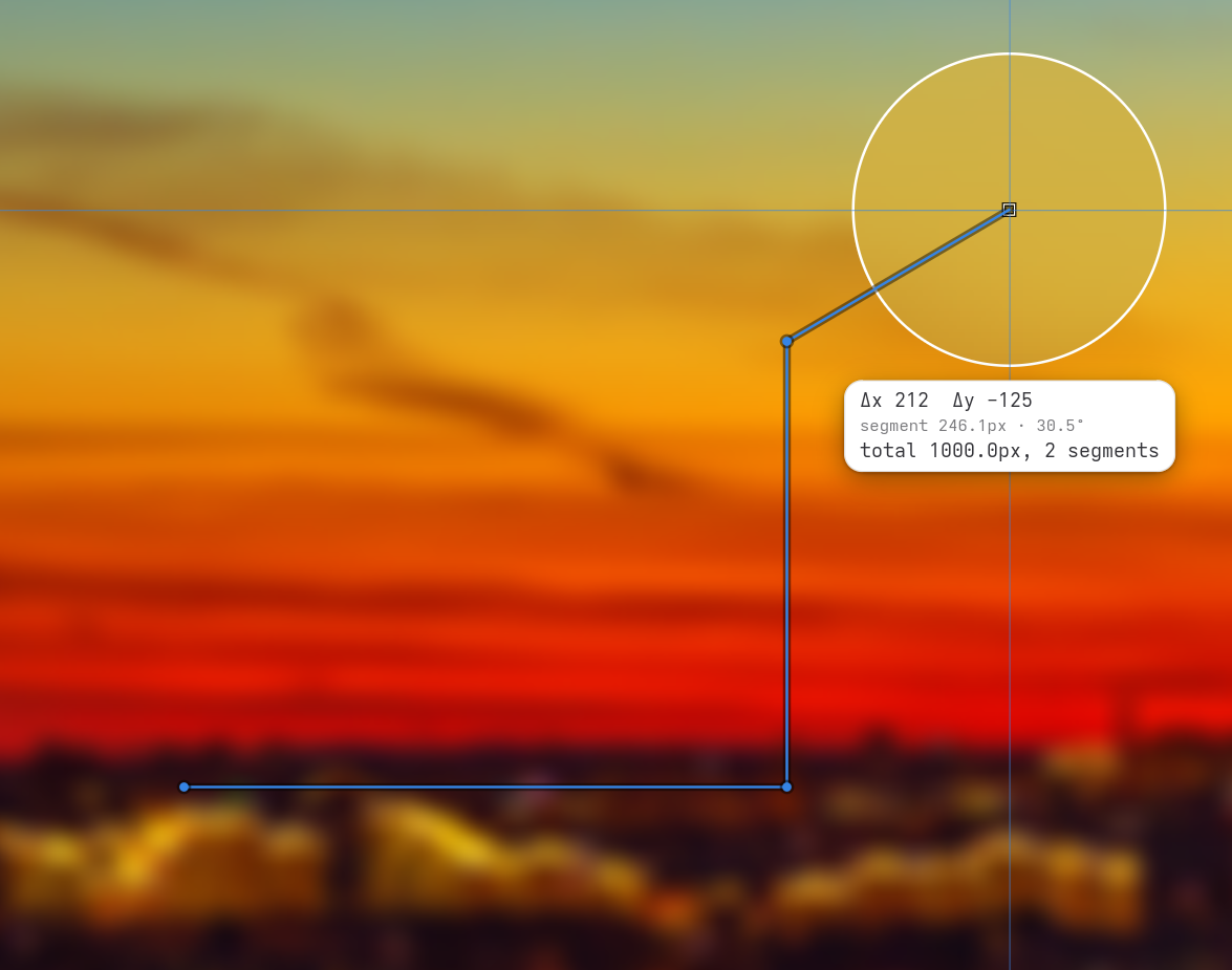 The ruler on a frozen screen: two measured segments drawn in blue, a third one following the pointer inside a magnifying lens, and a pill showing the offset, the segment length and angle, and the total length